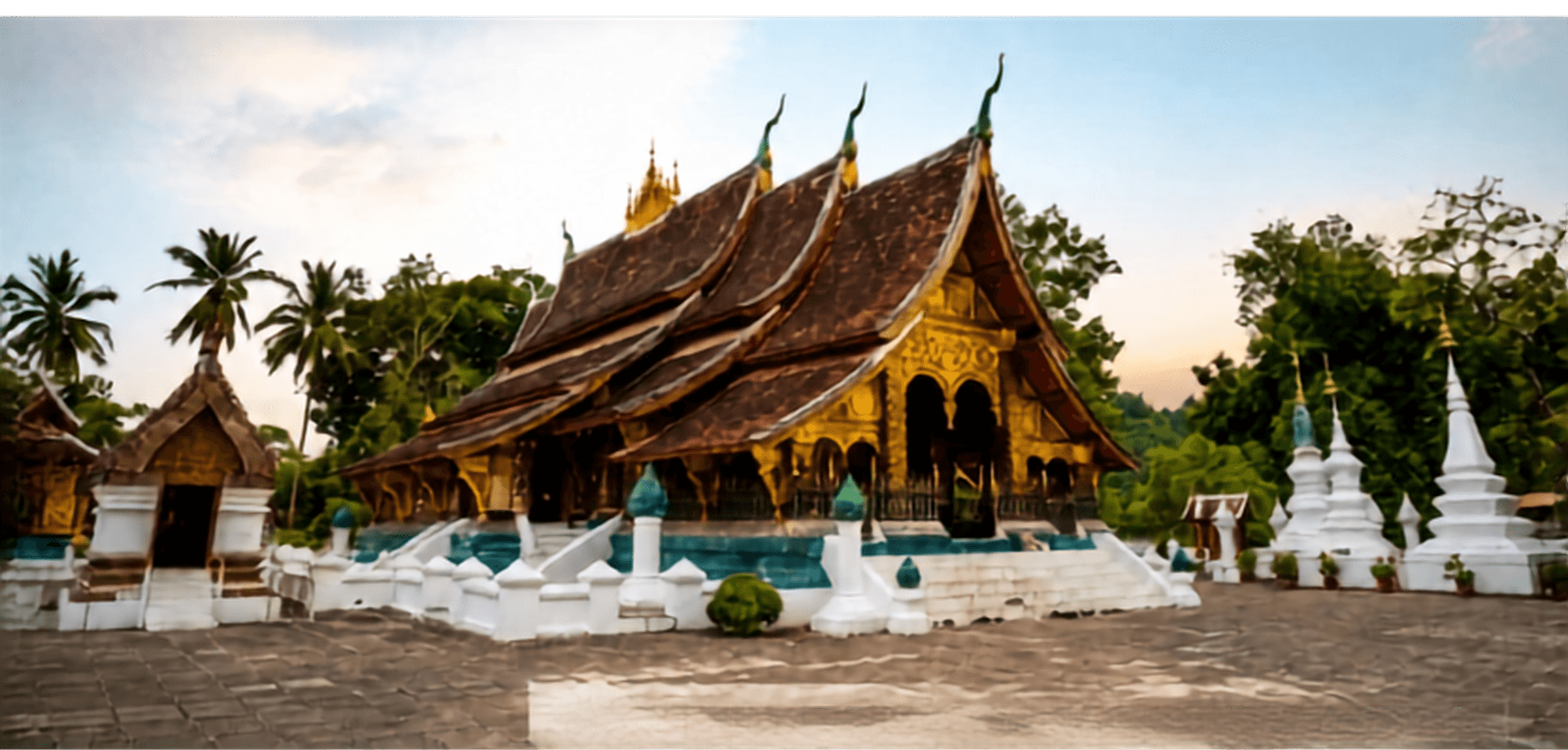 Wat Xieng Thong, a golden-roofed Buddhist temple in Luang Prabang, Laos, surrounded by palm trees.